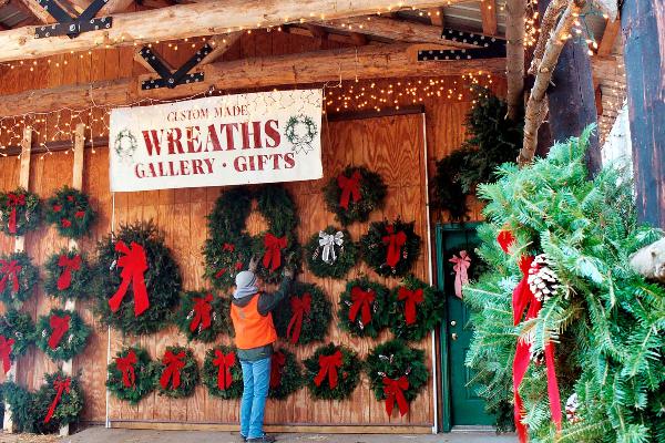 Kip re-stocks wreathes after a busy day